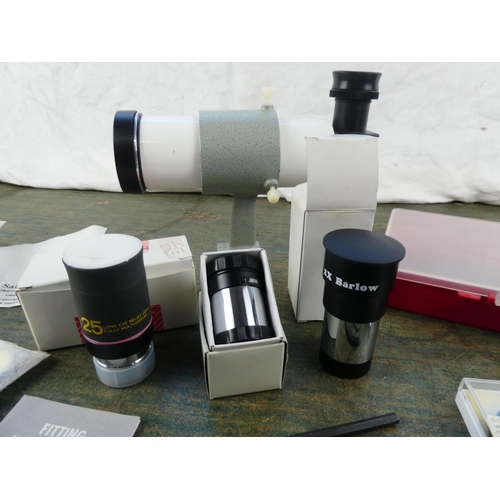 300 - An assortment of telescope lenses etc.