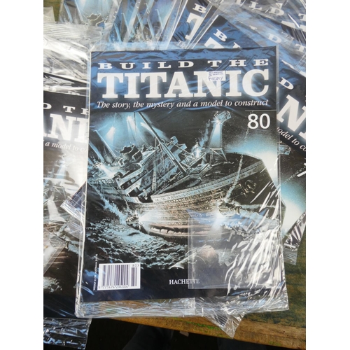 305 - A large set of Build the Titanic magazine kits, along with part built model.