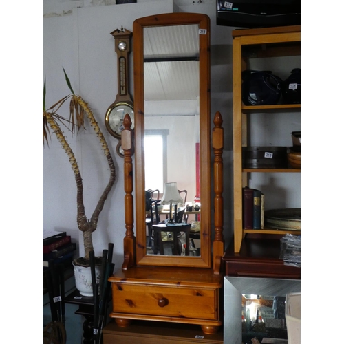 318 - A pine cheval dressing mirror with drawer.