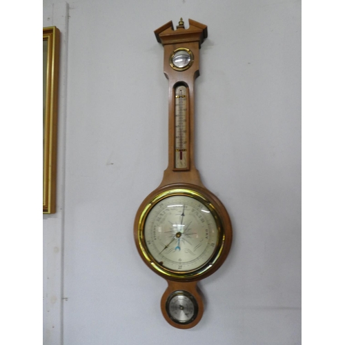 328 - A stunning light oak barometer.