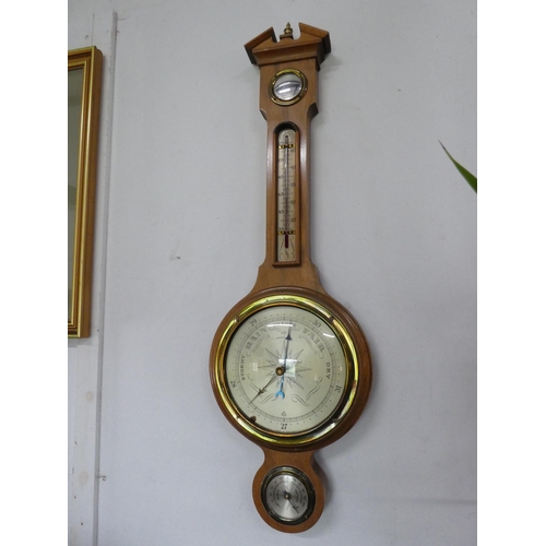 328 - A stunning light oak barometer.