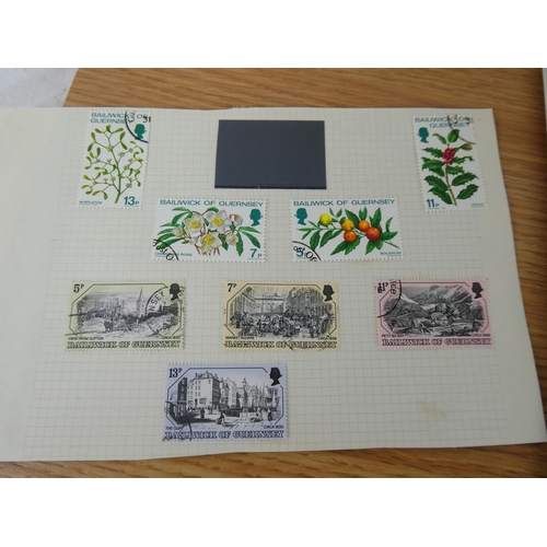 345 - A lot of Guernsey and Netherland stamps on sheets.