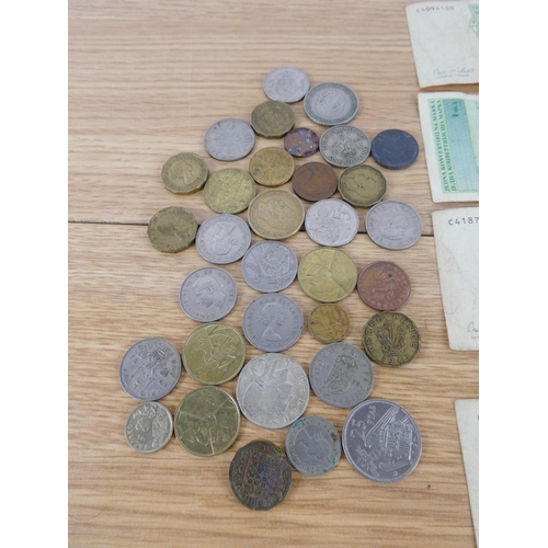 346 - A large assortment of coinage and bank notes.