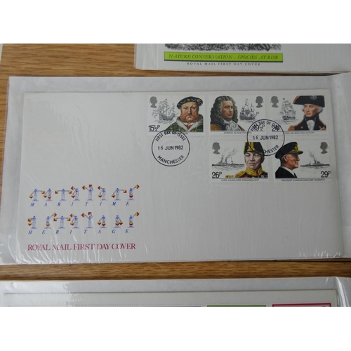 370 - A collection of nine First Day Covers.