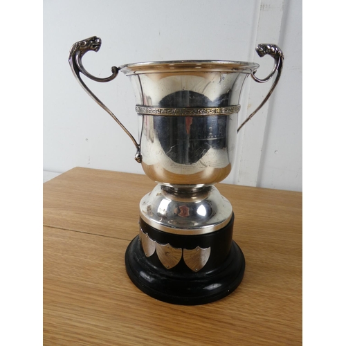 405 - A large silver plated two handled presentation cup.