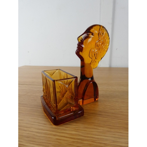 406 - An Art Deco amber glass holder.