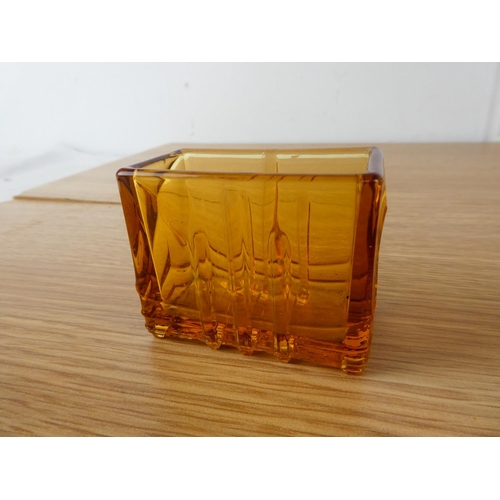 406 - An Art Deco amber glass holder.