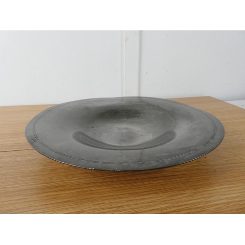 413 - A superb vintage pewter plate by German maker Just, number 1016, measuring 29cm diameter.