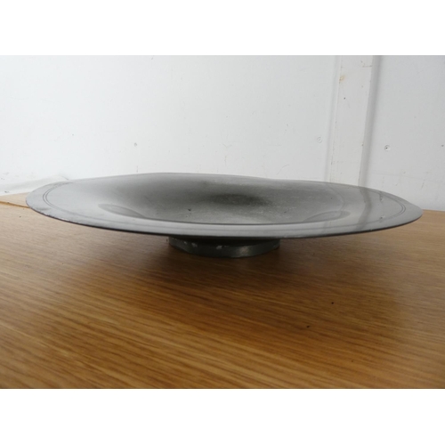 413 - A superb vintage pewter plate by German maker Just, number 1016, measuring 29cm diameter.