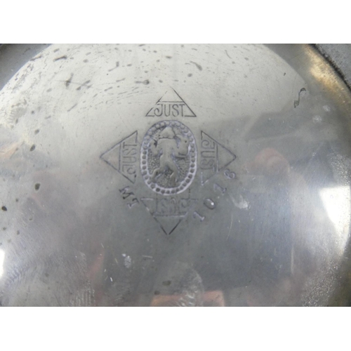 413 - A superb vintage pewter plate by German maker Just, number 1016, measuring 29cm diameter.