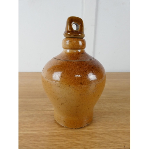 414 - A small stoneware flagon by Doulton Lambeth.