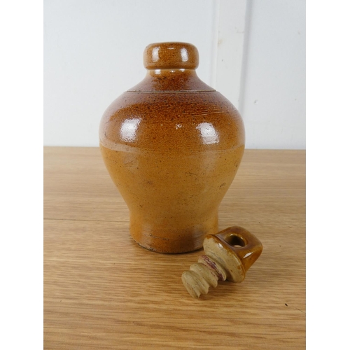 414 - A small stoneware flagon by Doulton Lambeth.