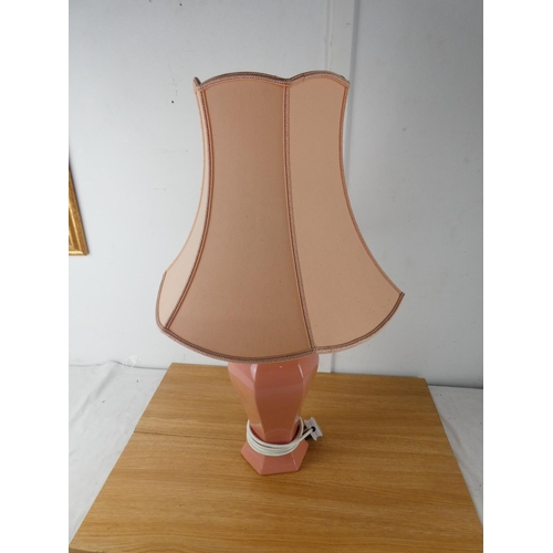 421 - A pink table lamp and shade.