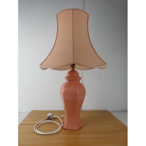 421 - A pink table lamp and shade.