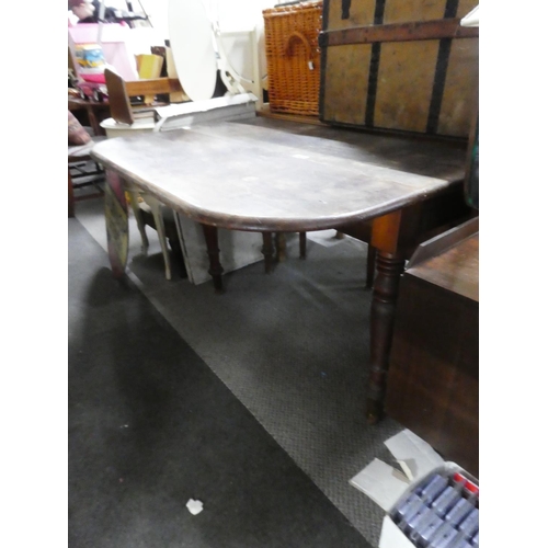 429 - An antique dining room table for restoration.