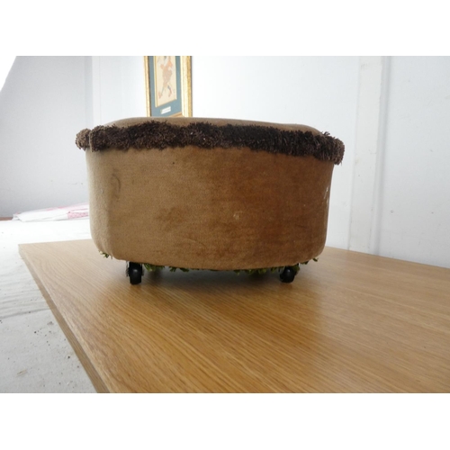 430 - An upholstered footstool.