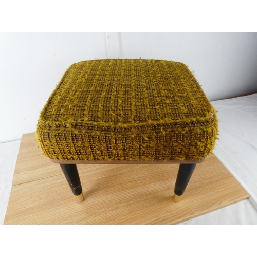 431 - An upholstered footstool.