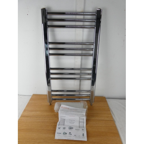 433 - A boxed aluminum towel rail and instructions.