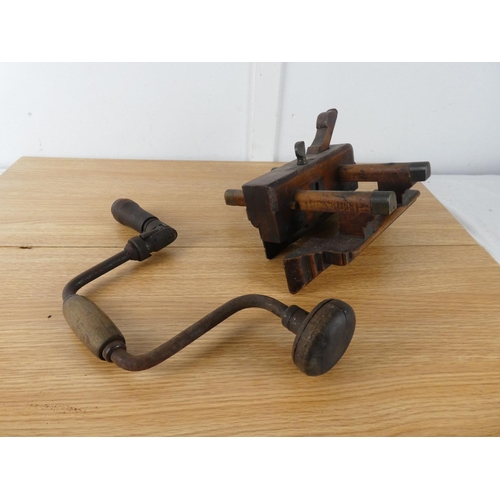 436 - An antique wooden angle plane and another.