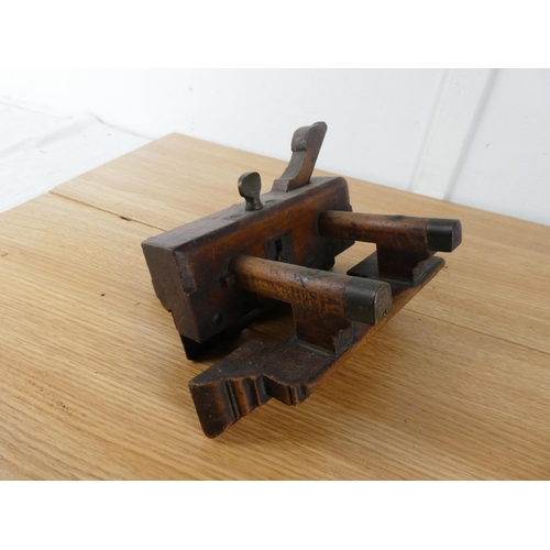 436 - An antique wooden angle plane and another.