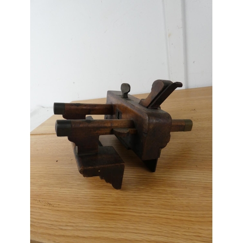 436 - An antique wooden angle plane and another.