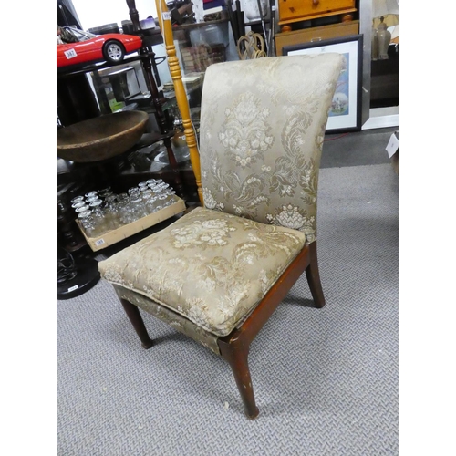 441 - An upholstered chair.