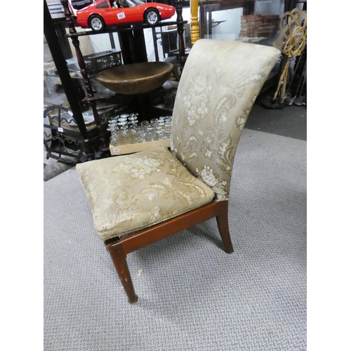 441 - An upholstered chair.