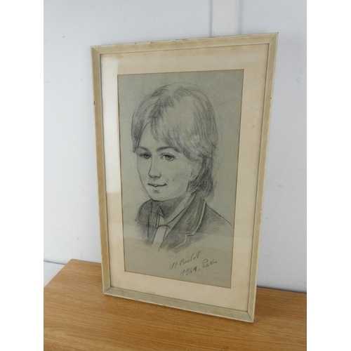 445 - A framed pencil drawing of a portrait, signed.