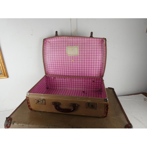 446 - Two vintage luggage cases.