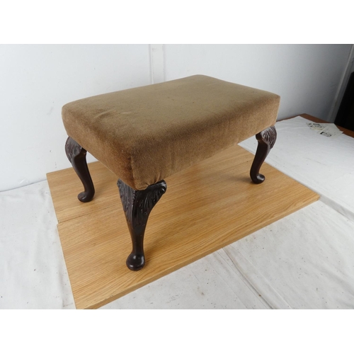 447 - An upholstered stool.