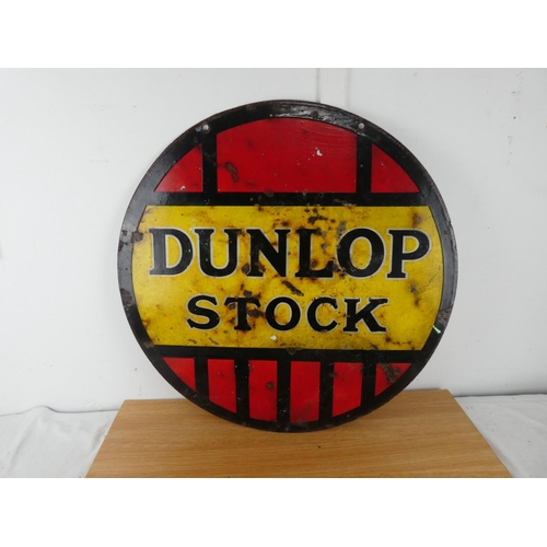 A stunning original double sided enamel sign, 'Dunlop Stock', measuring 24" wide.