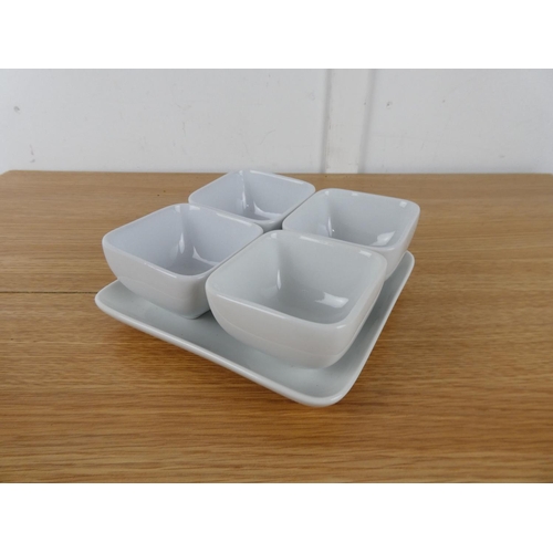 449 - A set of four Denby dishes on a serving tray.