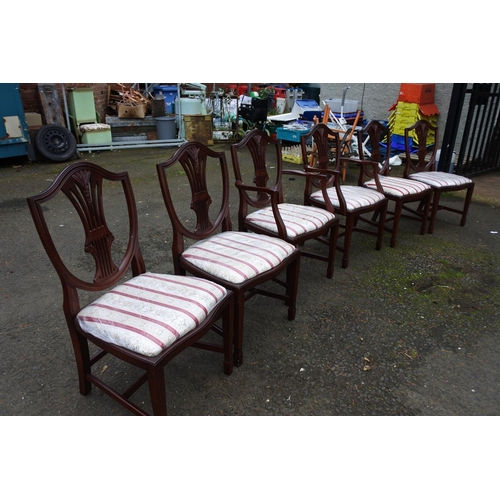 457 - A set of six dining room chairs.