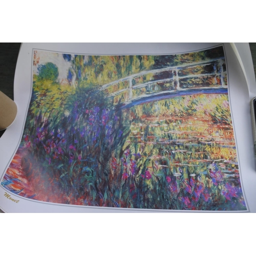 459 - A lot of Monet unframed prints.