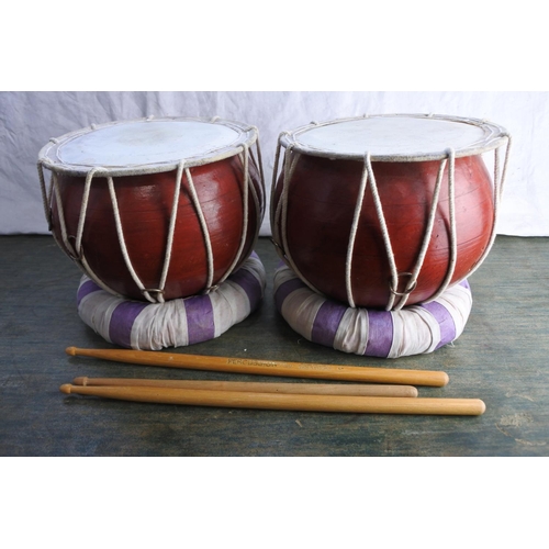 466 - Two drums with percussion plus sticks.