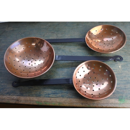 470 - Three copper sieves.