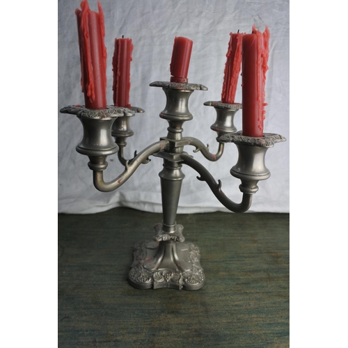 472 - A 5 branch silver plated candelabra.