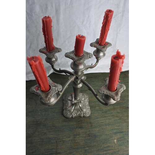 472 - A 5 branch silver plated candelabra.