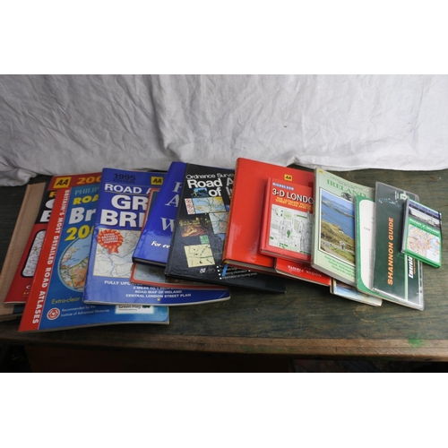 473 - A large assortment of Atlas map books and more.