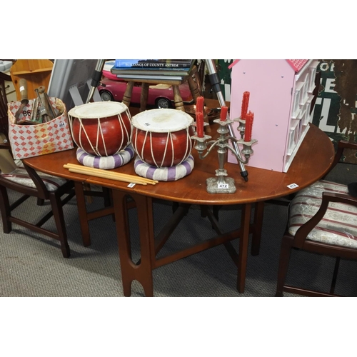 474 - A drop leaf dining room table.