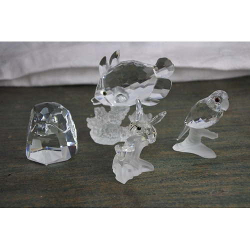 484 - A stunning set of four Swarovski animal figures.