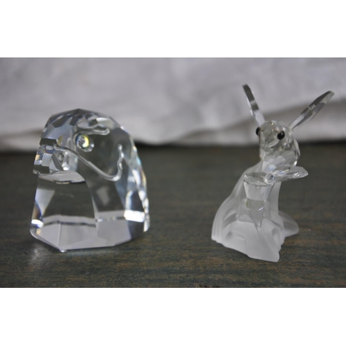 484 - A stunning set of four Swarovski animal figures.