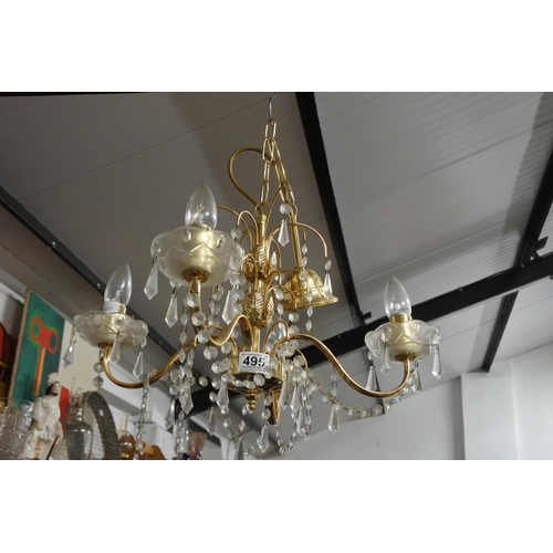 495 - A brass metal and glass chandelier,