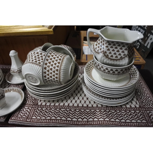 497 - A large set of Adams dinnerware to include place mats.