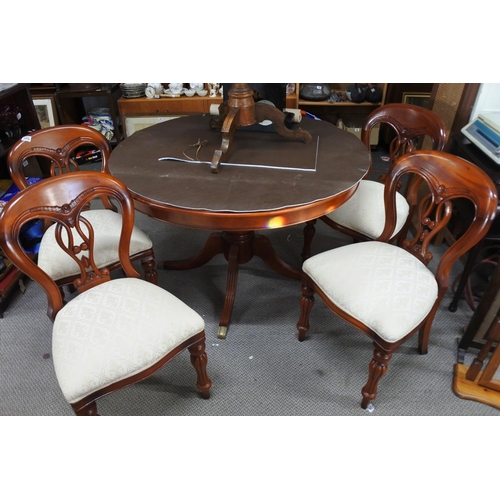 508 - A stunning set of four balloon backed dining room chairs and matching dining room table.