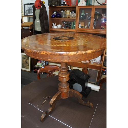 512 - A stunning antique centre table with inlay detail to top and tripod base. Measuring 70cm wide and 70... 