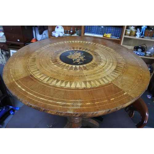 512 - A stunning antique centre table with inlay detail to top and tripod base. Measuring 70cm wide and 70... 