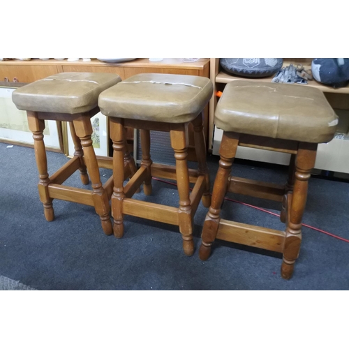 521 - Three vintage bar stools.