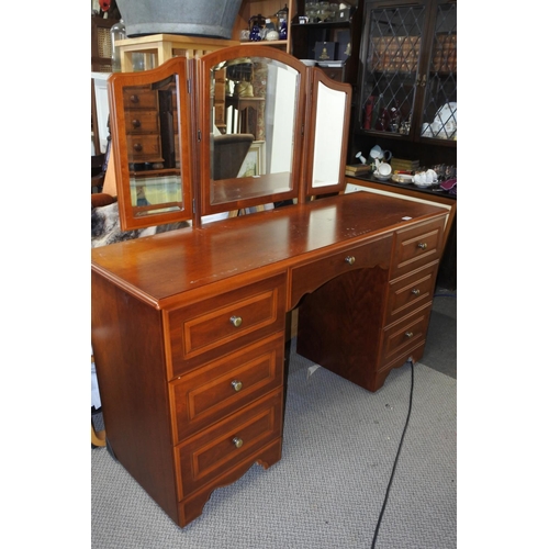 537 - A McDonagh dressing table and mirror.