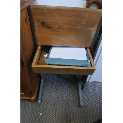 542 - A vintage child's metal framed desk.